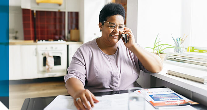 A woman talks to a broker about the five types of Medicare Advantage plans.