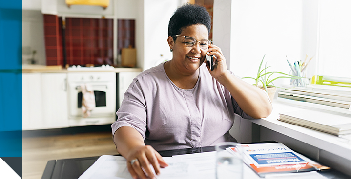 A woman talks to a broker about the five types of Medicare Advantage plans.